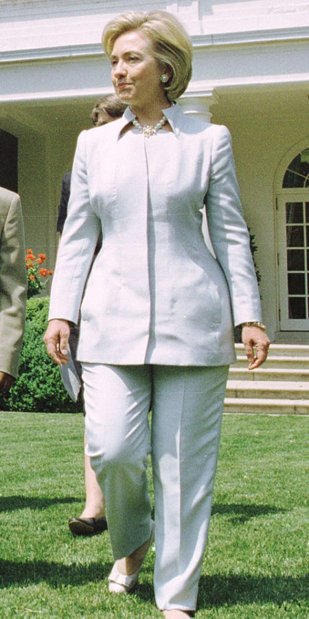 President Bill Clinton and Hillary Clinton walk with Arthur Sawe, 9, of Seattle through the Rose Garden of the White House June 1, 1999. Clinton asked Hollywood and video-game makers to "show some restraint" in using bloody images to market their wares. Sawe spoke out against violence in video games (photo by Richard Ellis)
