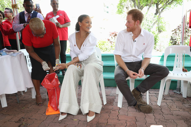 BRIDGETOWN, BARBADOS - DECEMBER 01:  Prince Harry (R) watches as  Singer Rihanna (L) gets her blood sample taken for an live HIV test, in order to promote more widespread testing for the public at the 'Man Aware' event held by the Barbados National HIV/AIDS Commission on the eleventh day of an official visit on December 1, 2016 in Bridgetown, Barbados.  Prince Harry's visit to The Caribbean marks the 35th Anniversary of Independence in Antigua and Barbuda and the 50th Anniversary of Independence in Barbados and Guyana.  (Photo by Chris Jackson - Pool/Getty Images)